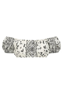 Ivory bandeau bikini top with black bandana and paisley print, puffed off-shoulder sleeves.