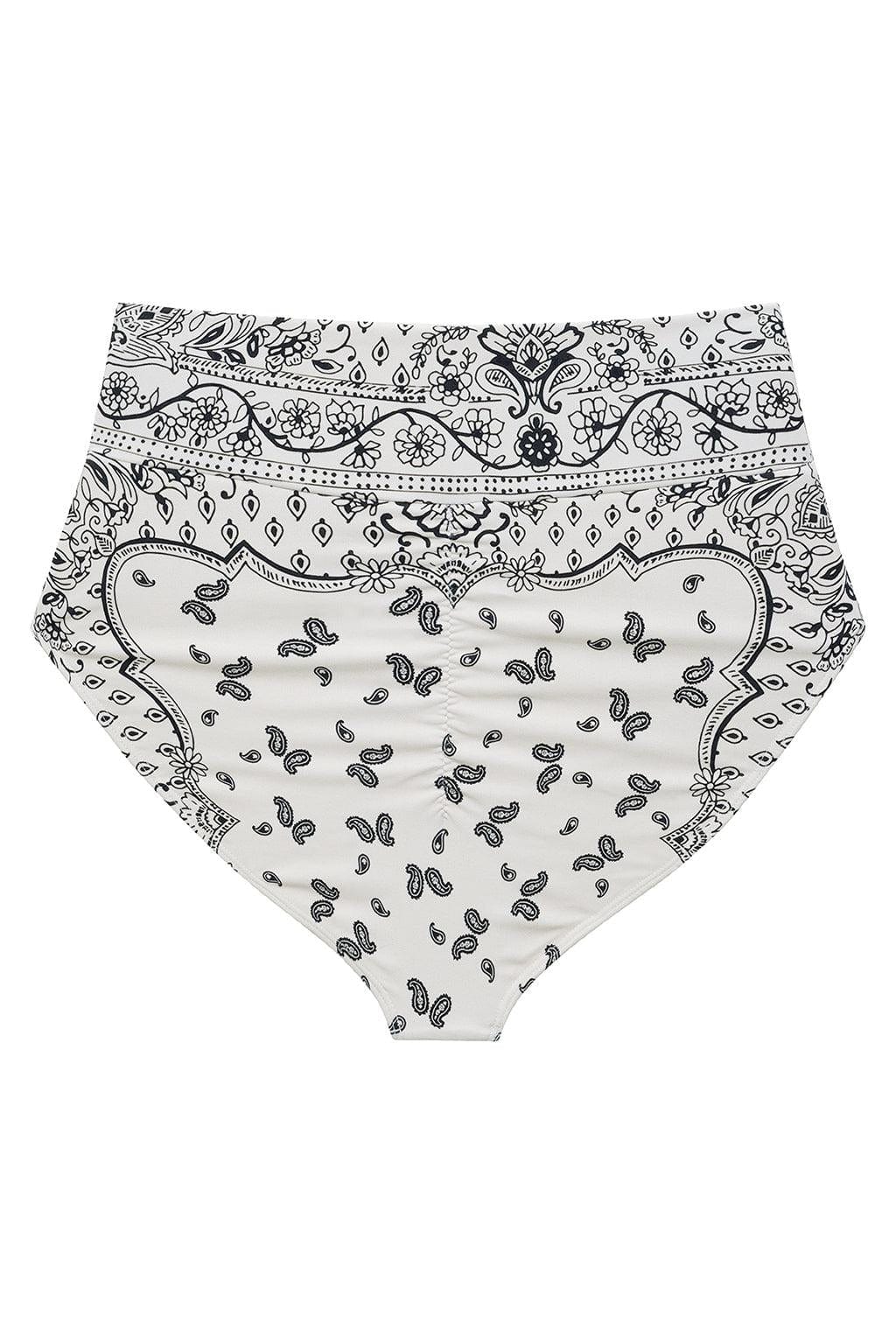 Black and white bandana-patterned high-rise bikini bottom with paisley and floral designs on cream background.