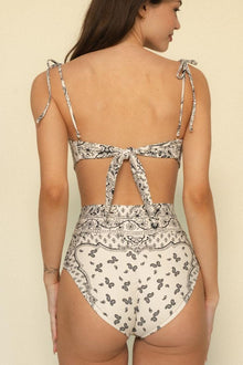 Cream and black bandana print high-rise bikini bottom with full coverage back view.
