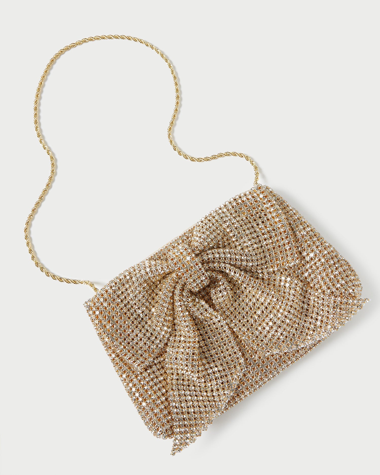Jolene Gold Diamante Bow Clutch in gold diamante