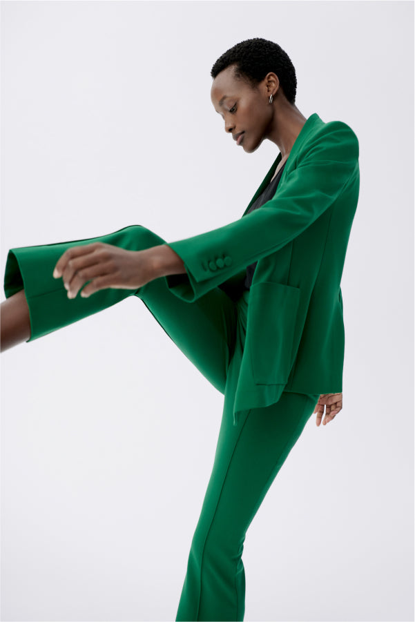 front image of a woman wearing the janette jacket in shamrock  | Exclude 