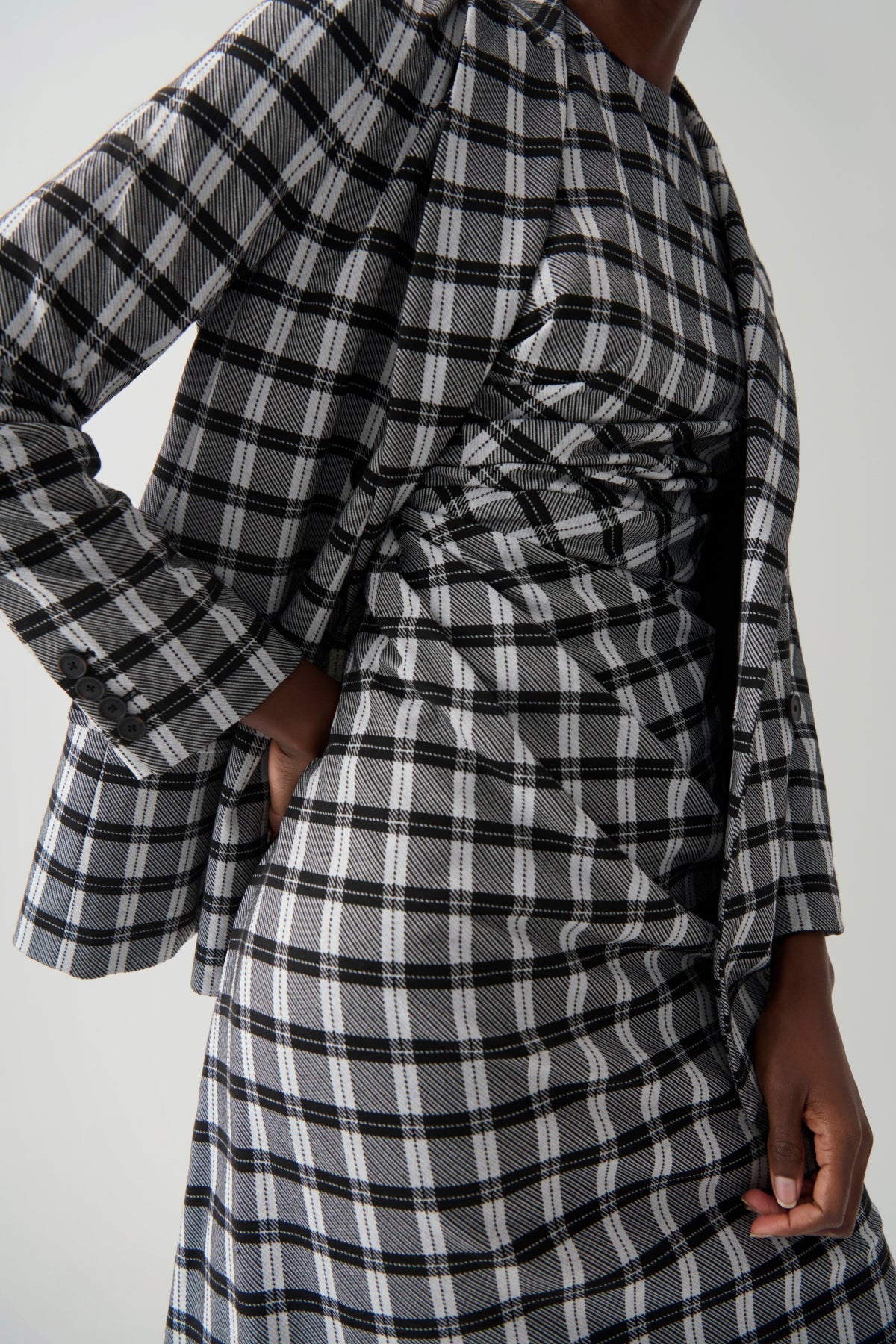 front image of a woman wearing the jeannine dress in checkmate | Exclude