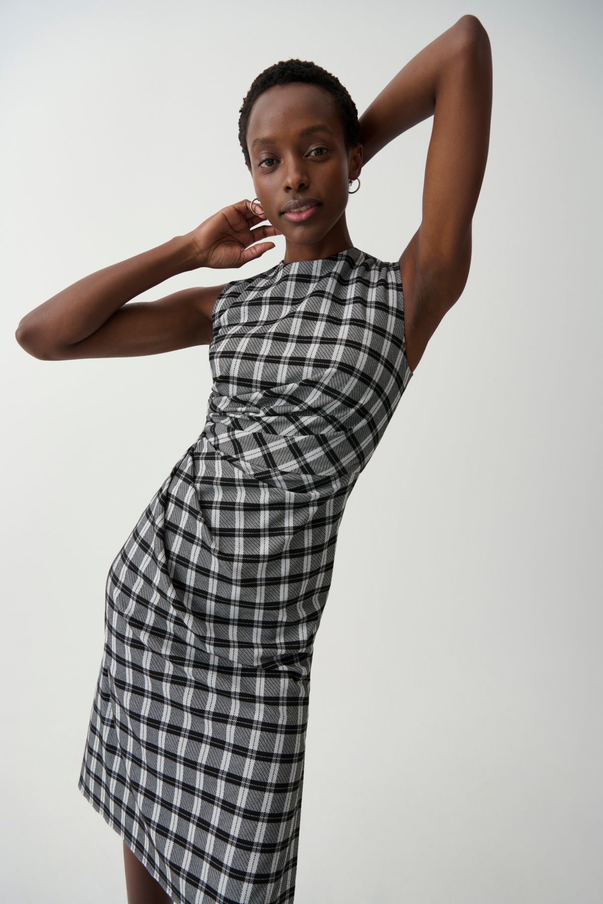 front image of a woman wearing the jeannine dress in checkmate | Exclude | ALT GRID