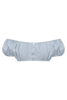 Light blue denim bikini top with off-shoulder design, puffed sleeves, and four button front closure.