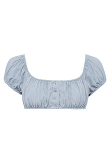 Light blue denim bikini top with puffed short sleeves, scoop neckline, and button front closure.