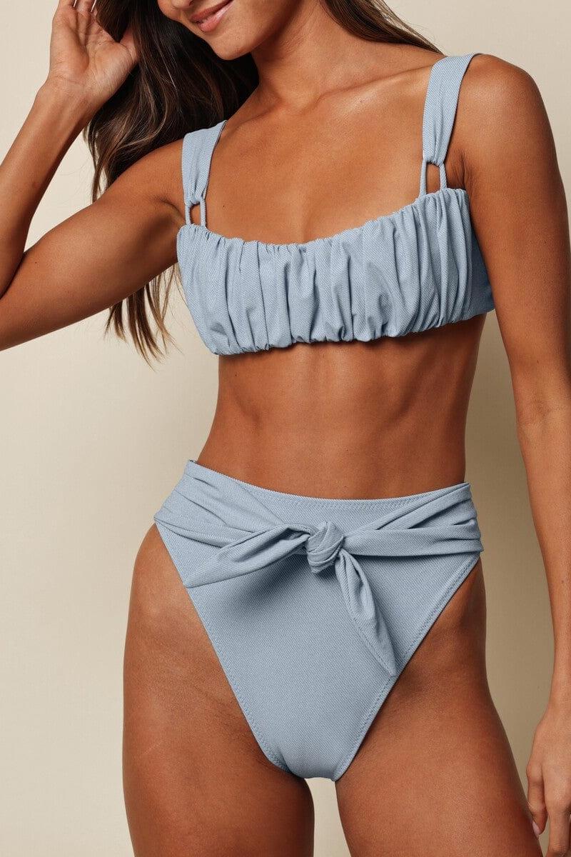 Light blue denim bikini top with ruched front panel and thin shoulder straps.