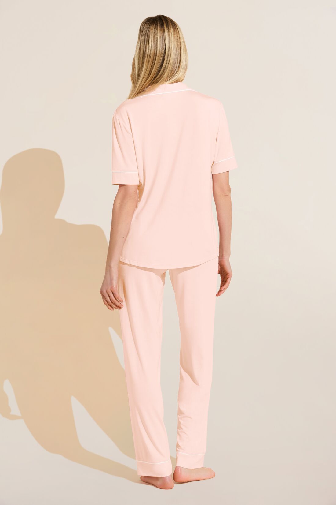 Model wears Gisele TENCEL Modal Short Sleeve & Pant PJ Set in petal pink/ivory.