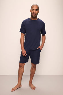 Model wears Henry TENCEL Modal Rib Short PJ Set in True Navy.