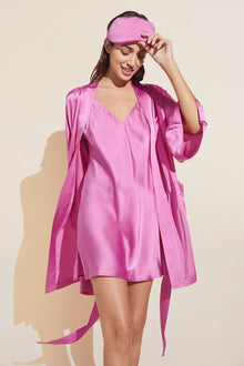 Model wears Inez Washable Silk Short Robe in Italian Rose.