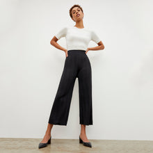 Front image of a woman wearing the Marijane Pant - Textured Knit in Black | Lead