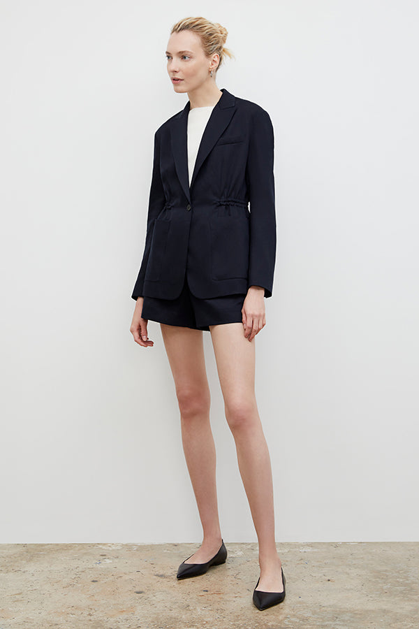Front image of a woman wearing the Hyo Jacket - Everyday Twill in Night | Exclude