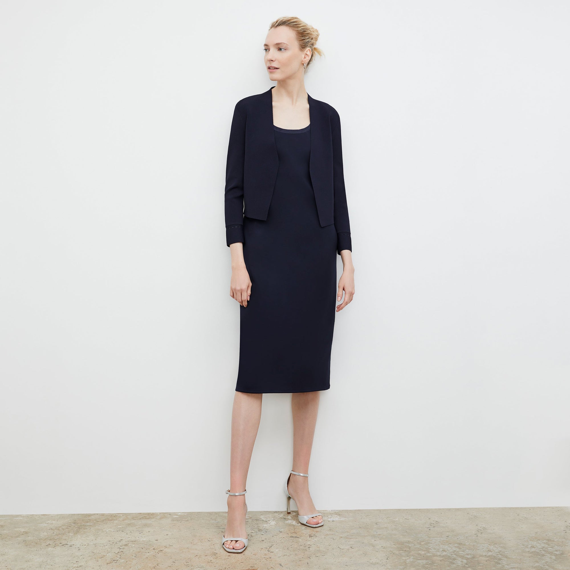 front image of a woman wearing the sant ambroeus jardigan in navy | Exclude