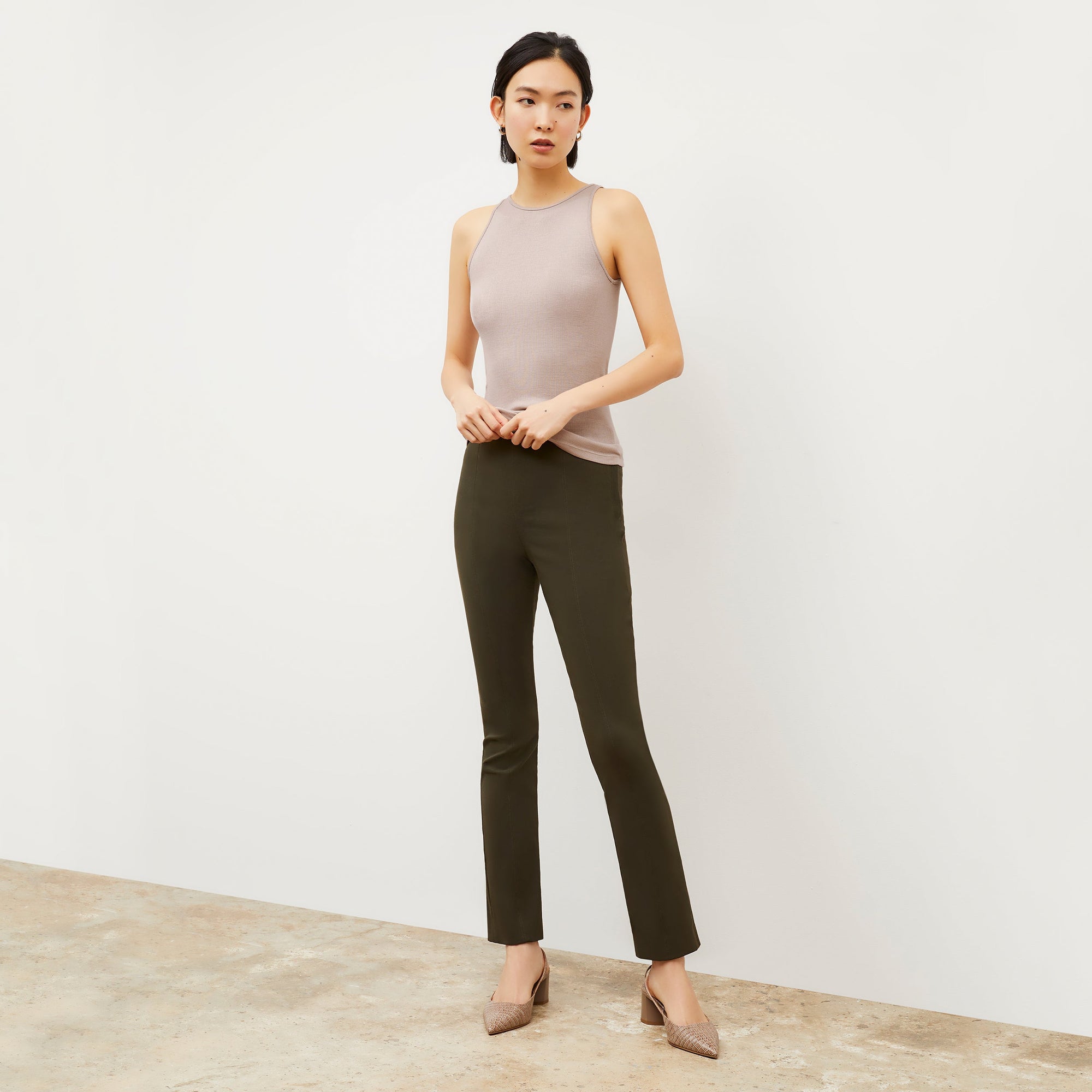 side image of woman wearing foster pant in dark olive