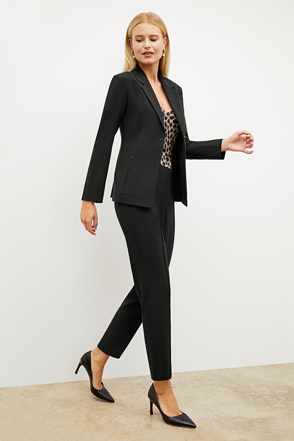 Front image of a woman standing wearing the Colby Jogger in Black | Exclude