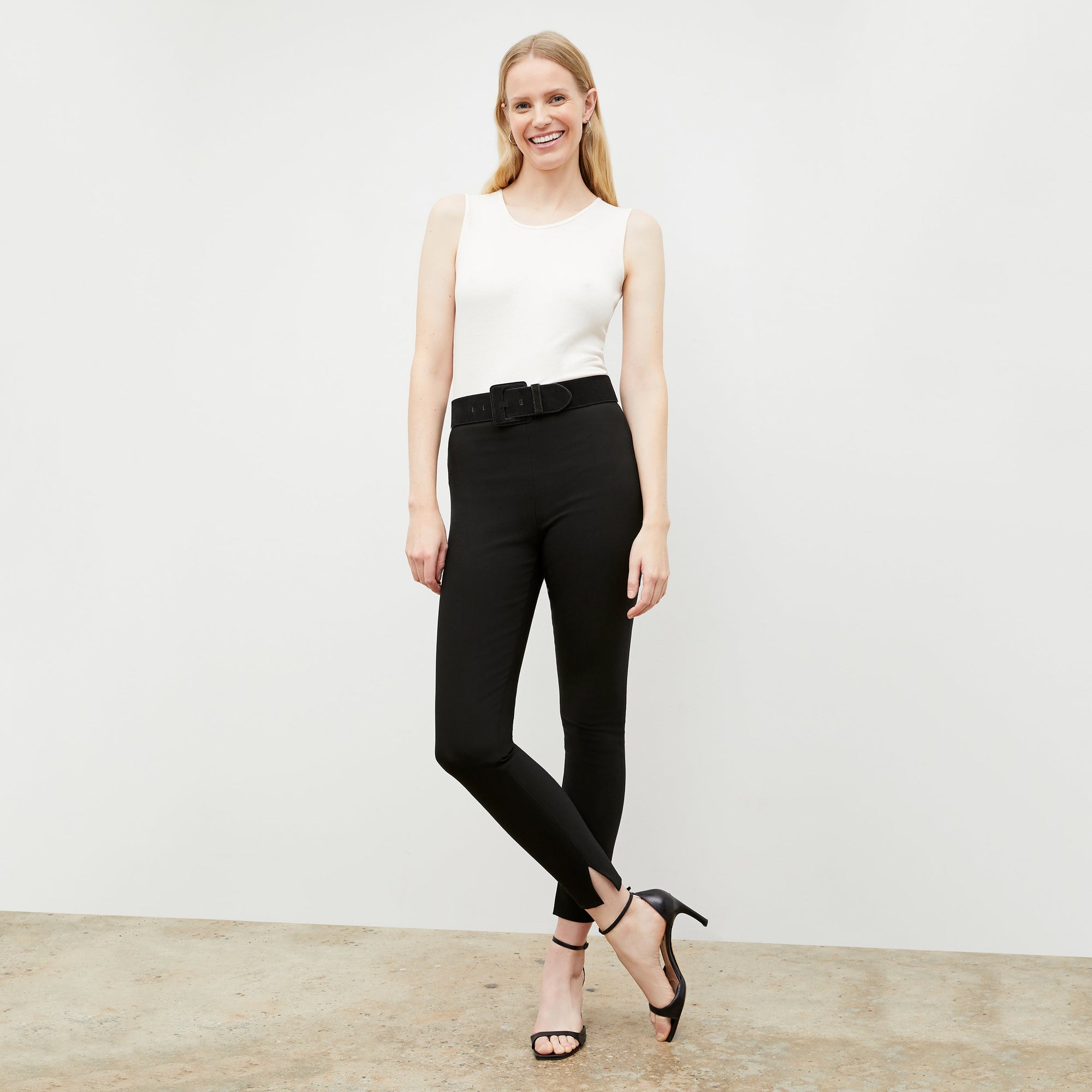 Front image of a woman wearing the skinny foster in black | Exclude