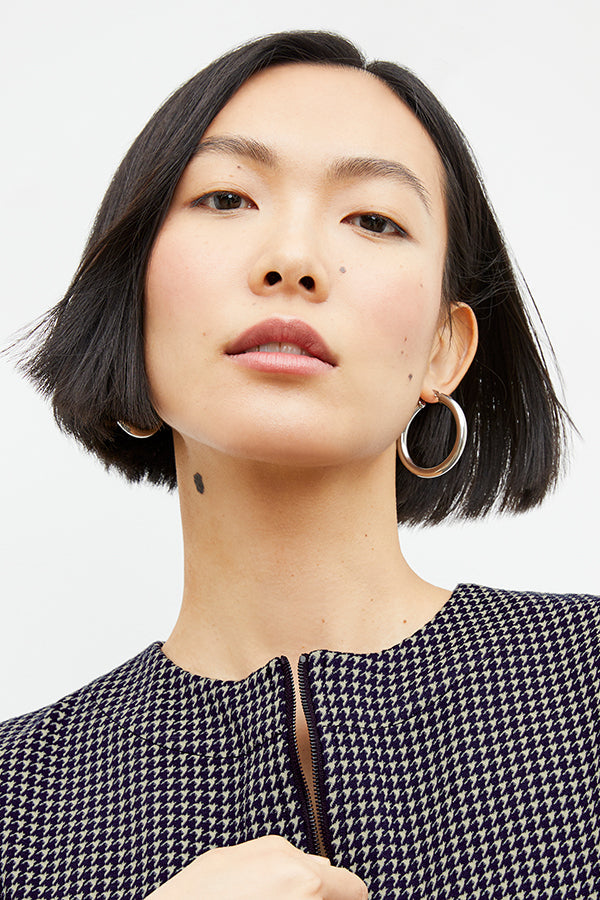 Front image of a woman wearing the tully top in black and white | Exclude