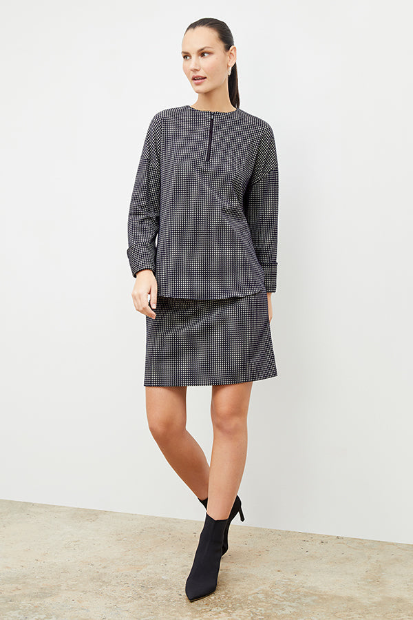 Front image of a woman wearing the tully top in black and white | Exclude