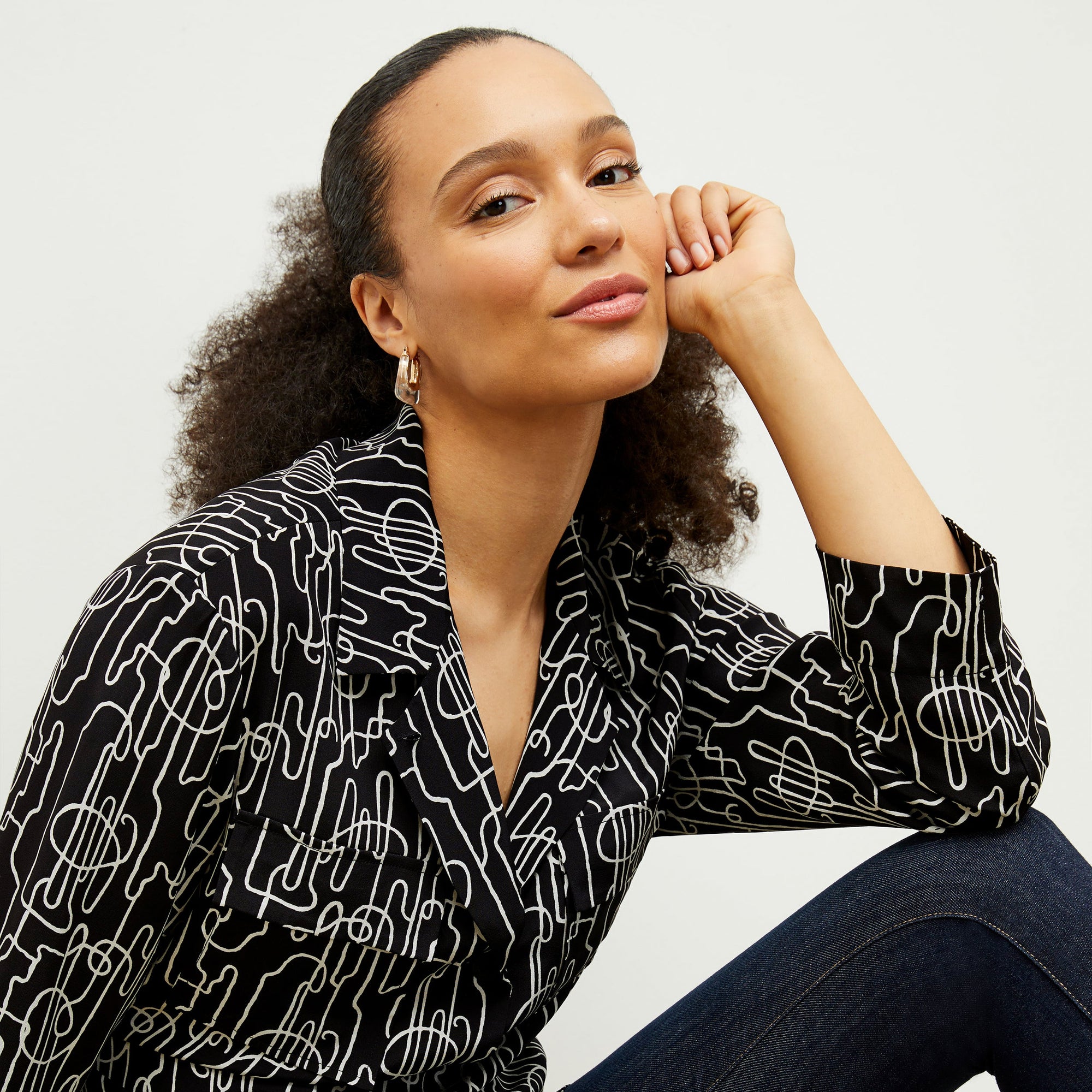 front image of a woman wearing the alyssa jacket in symphony print | Exclude