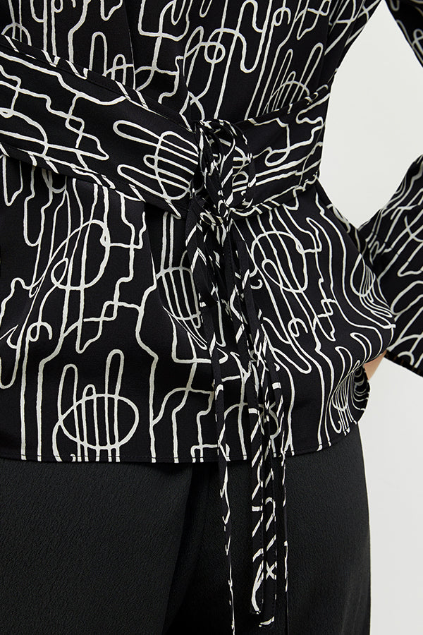 front image of a woman wearing the alyssa jacket in symphony print | Exclude