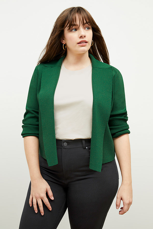 Front image of a woman standing wearing the leslie top in compact cotton in ivory | Exclude