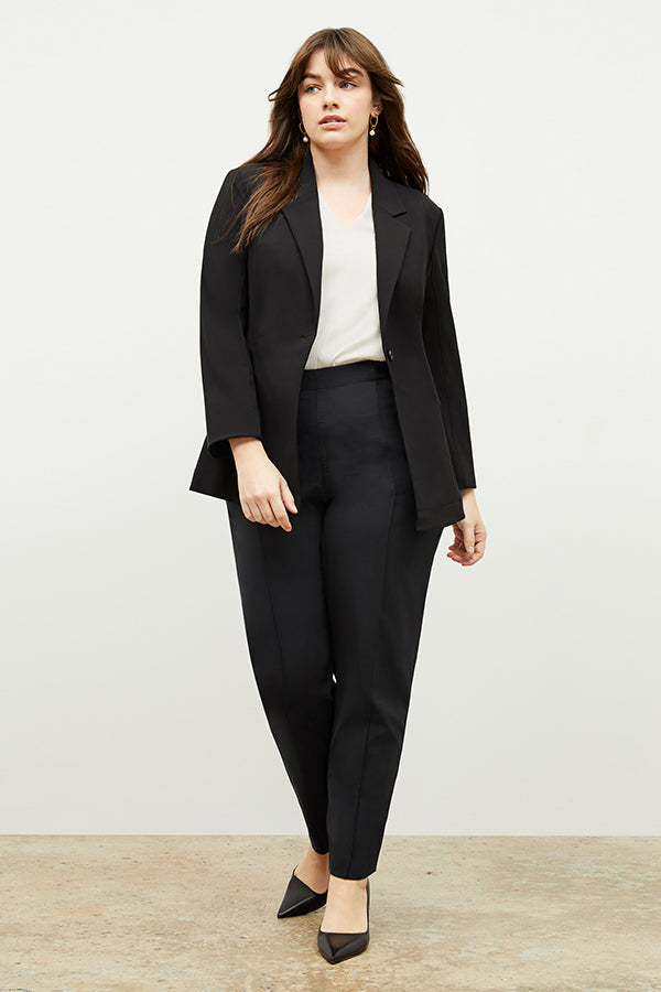 Front image of a woman standing wearing the Colby Jogger in Black | Exclude