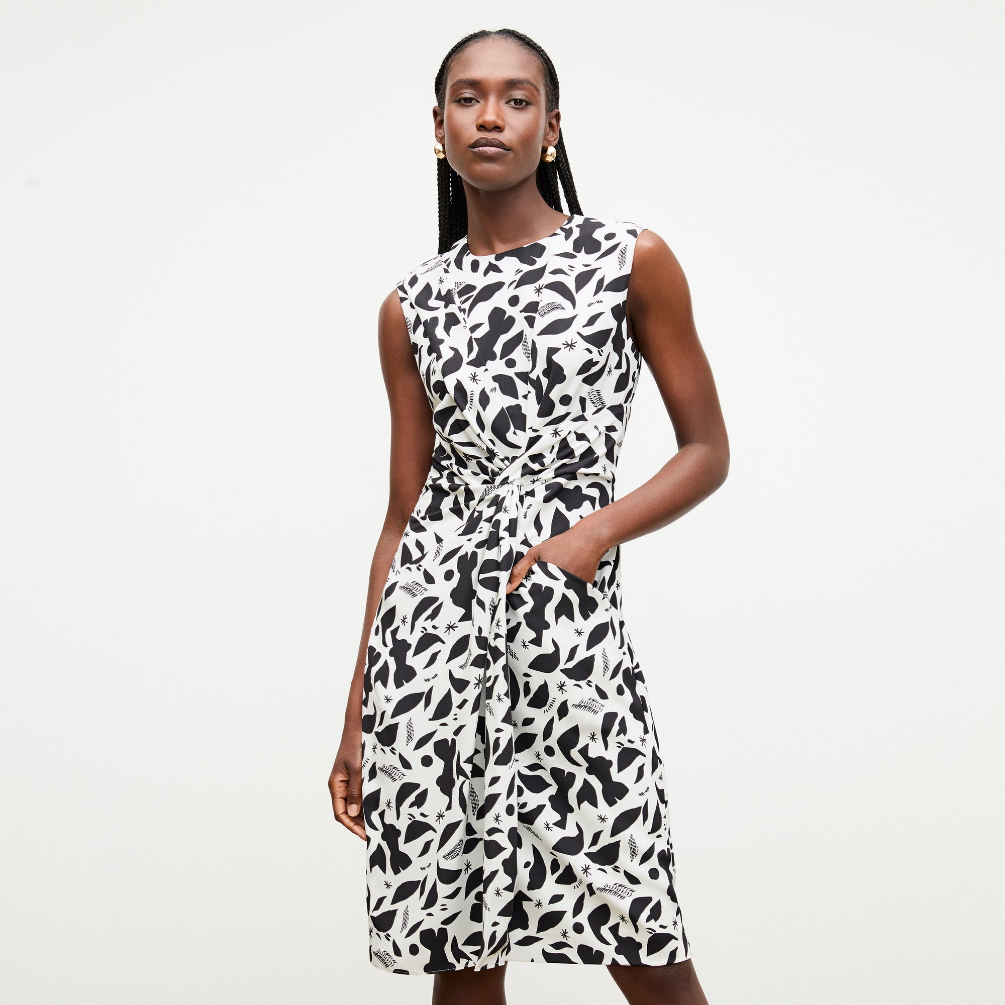 front image of a woman wearing the taylor dress in icon print | Lead