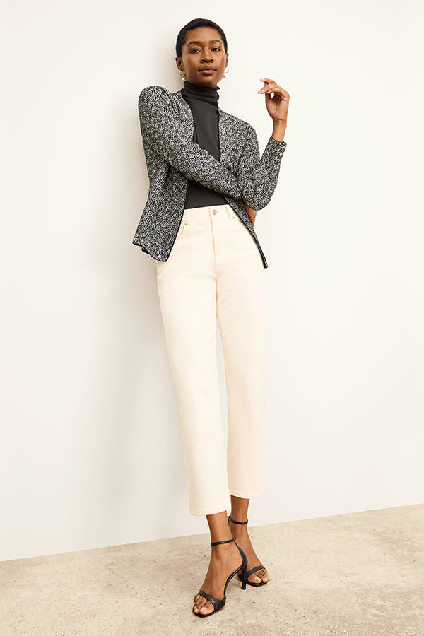 front image of a woman wearing the woolf jardigan in black/ivory | Exclude