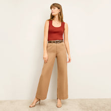 front image of a woman wearing the milo jean in saddle