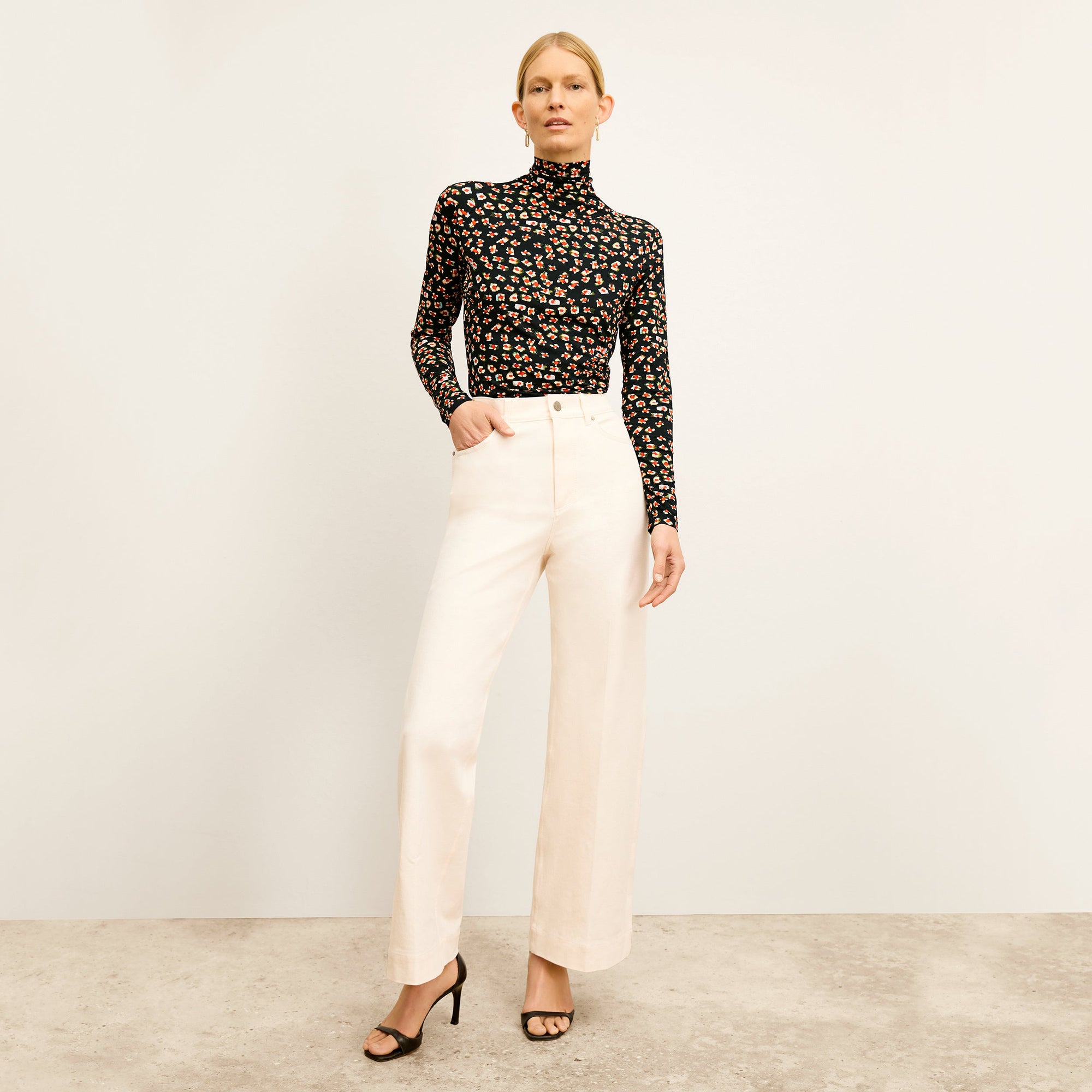Front image of a woman wearing the Milo Jean in Tusk | Exclude