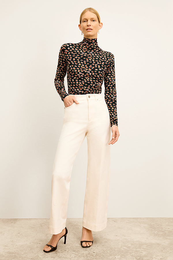 Front image of a woman wearing the Milo Jean in Tusk | Exclude