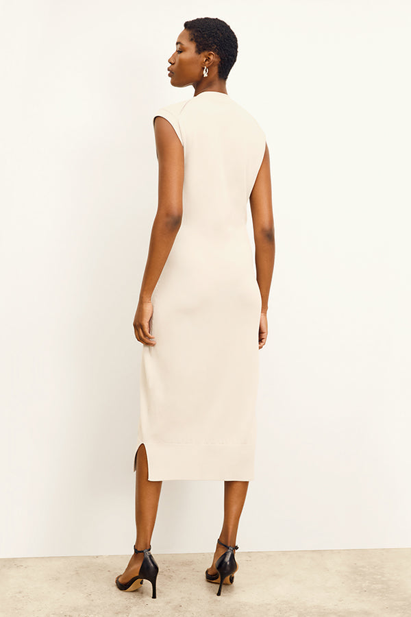 front image of a woman wearing the toula dress in ivory | Exclude 