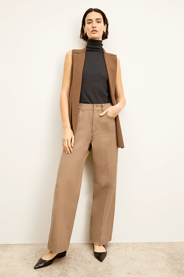  front image of a woman wearing the milo jean in saddle | Exclude