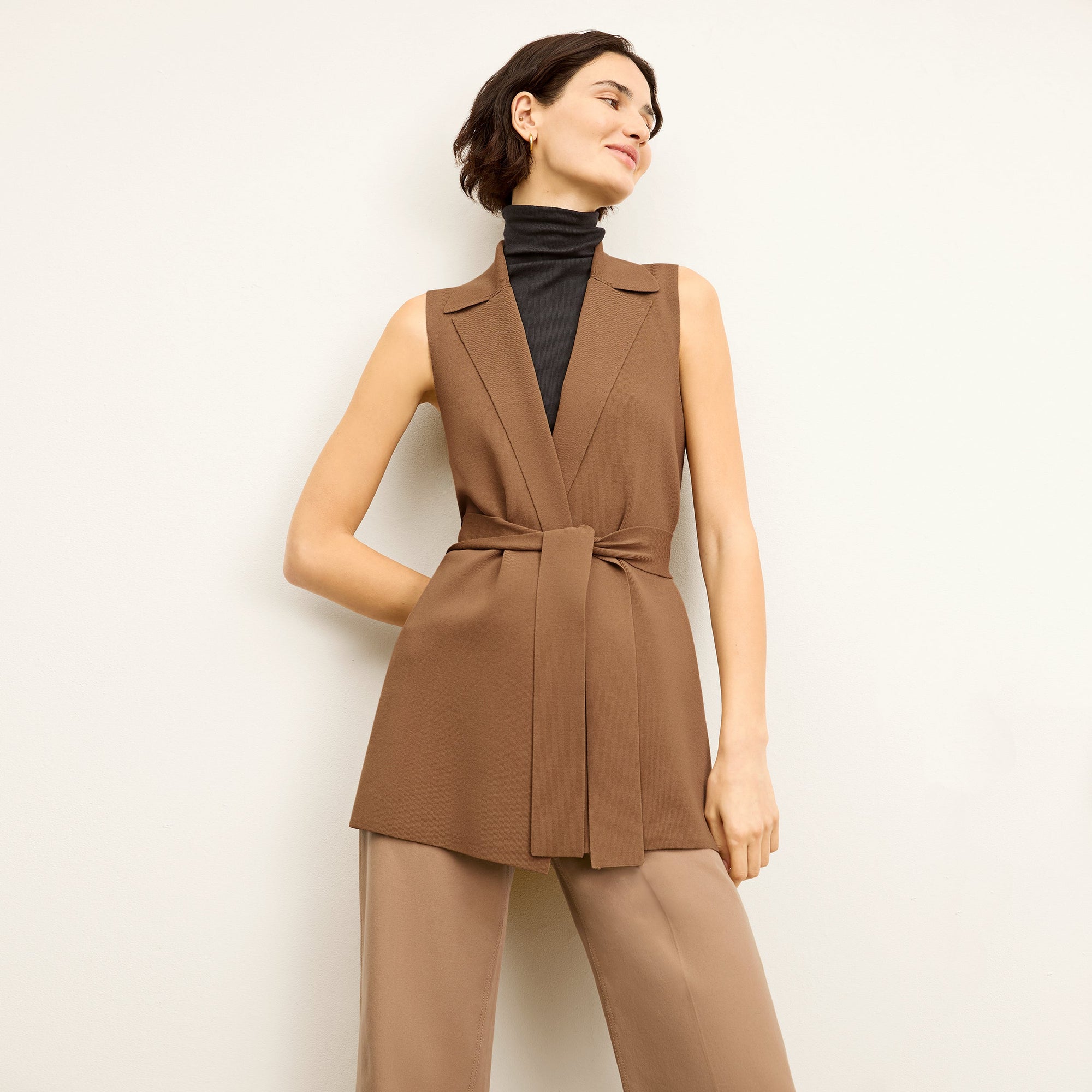 front image of a woman wearing the milo jean in saddle | Exclude