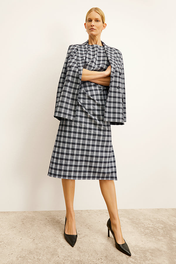 front image of a woman wearing the jeannine dress in checkmate | Exclude | Grid Hover