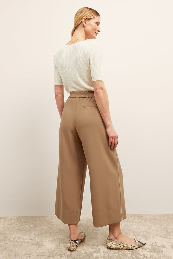 front image of a woman wearing the charlie top in ivory | Exclude