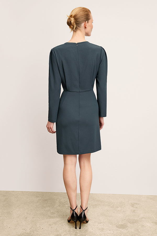 front image of a woman wearing the wallen dress in ocean | Exclude