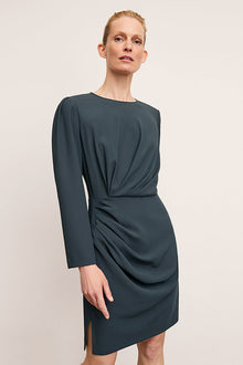 front image of a woman wearing the wallen dress in ocean | Exclude | Grid