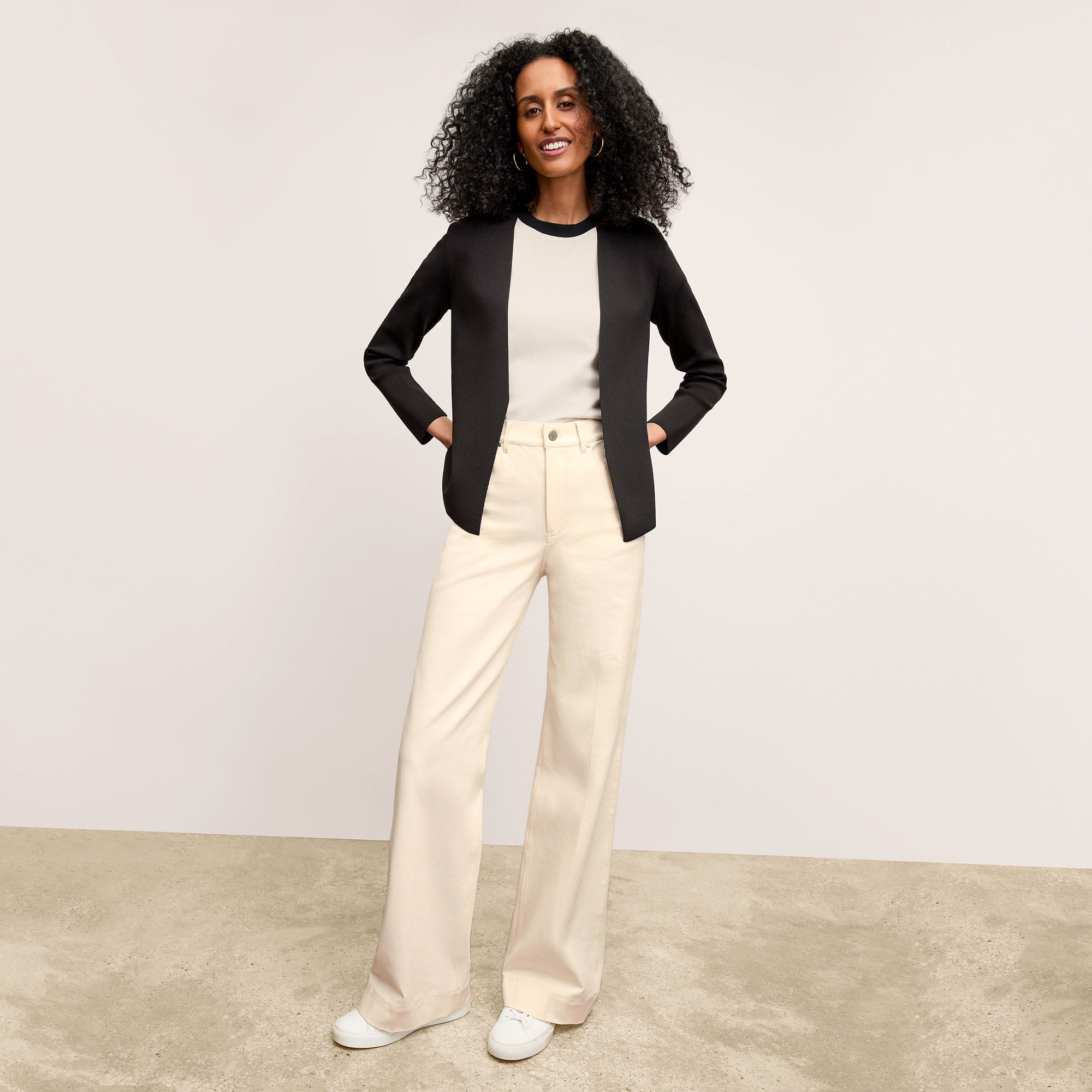 Front image of a woman wearing the Milo Jean in Tusk | Exclude