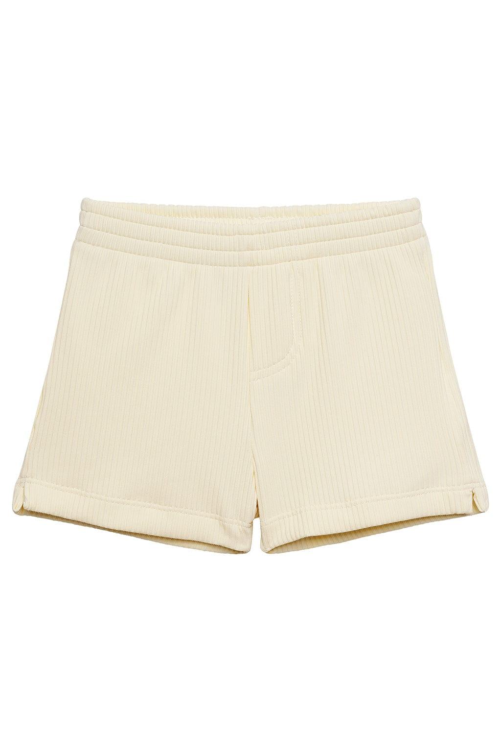 Cream ribbed swim trunk with elastic waistband and rolled cuffs.