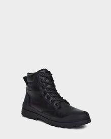 The Rudsak ARTUR - M223501 Black is a men's ankle boot with weather-treated leather, rugged rubber sole, metal eyelets, and reinforced stitching, shown at a slight angle on a plain light gray background.