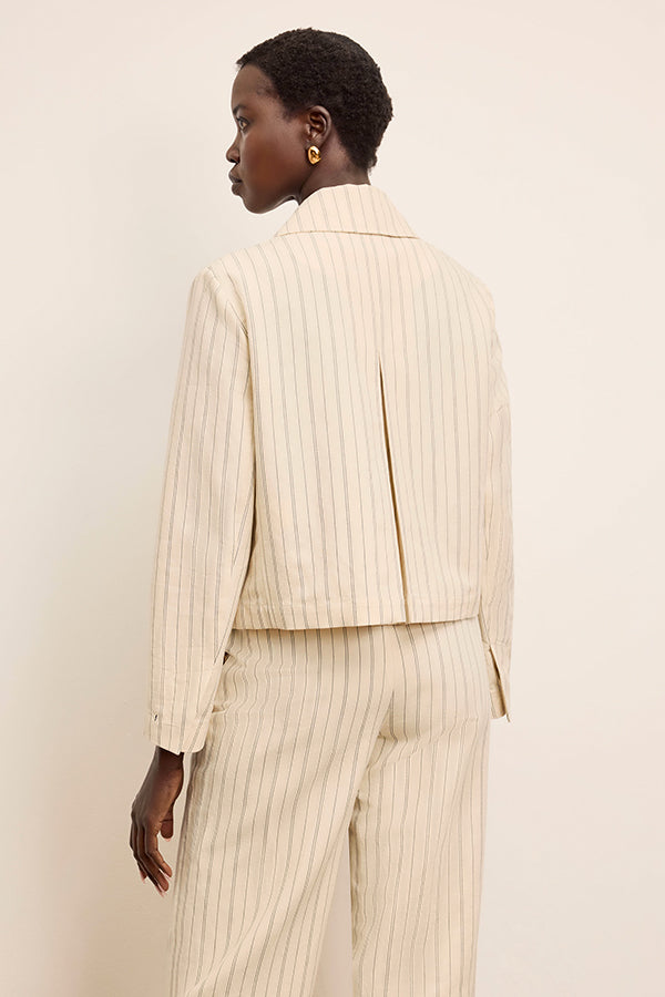 back image of a woman wearing the nicky jacket in linen stripe | Exclude