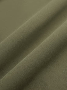 Close-up of olive Melt fabric showing smooth, soft texture.