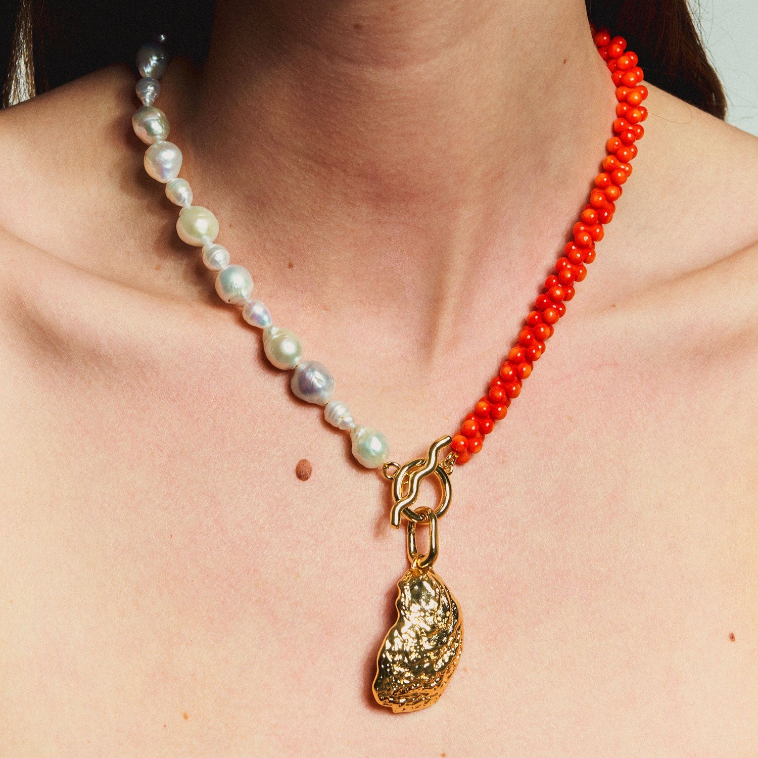 Orange Bead and Freshwater Pearl with Gold Oyster Shell Charm Pendant Necklace Styled on Model