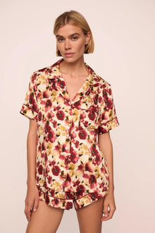 Model is wearing Inez Washable Silk Printed Short PJ Set in Botanical Flower Merlot/Merlot