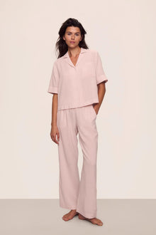 Model is wearing Nautico Relaxed Short Sleeve & Pant PJ Set in  Feeder Stripes Pale Mauve/White