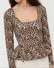 Posie Peplum Top in leopard print jersey material and Winona Denim Barrel Pants in natural.