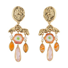 Crystal, Pearl, Bead, and Gold Chandelier Drop Earrings On Flat White Background