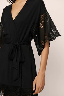 Model is wearing Beatrix TENCEL Modal Robe in Black