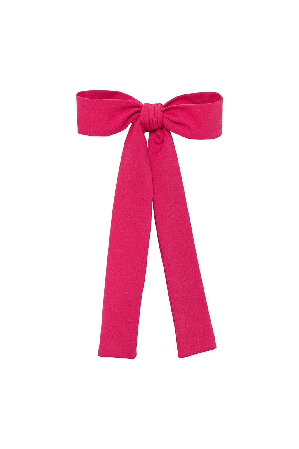 Bright pink ribbon bow with long trailing tails and knot detail at center.