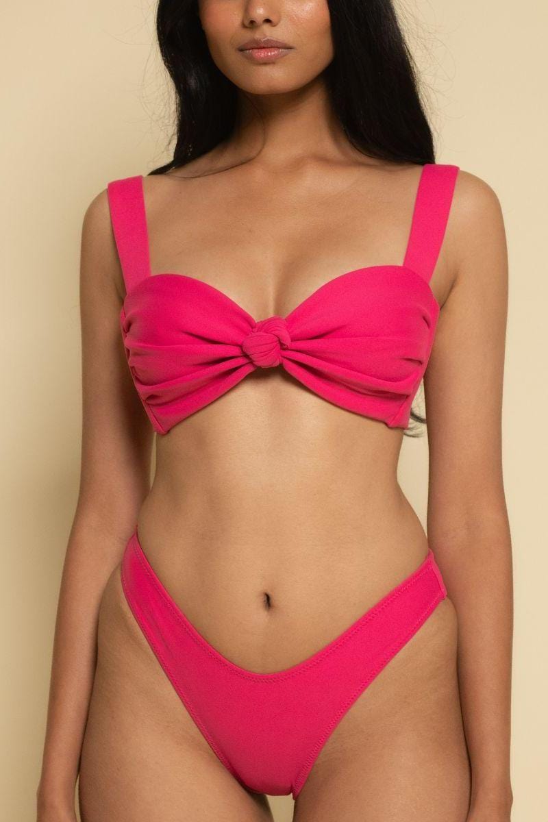 Raspberry pink bikini bottom with high-waisted cut and zig-zag stitched side seams.